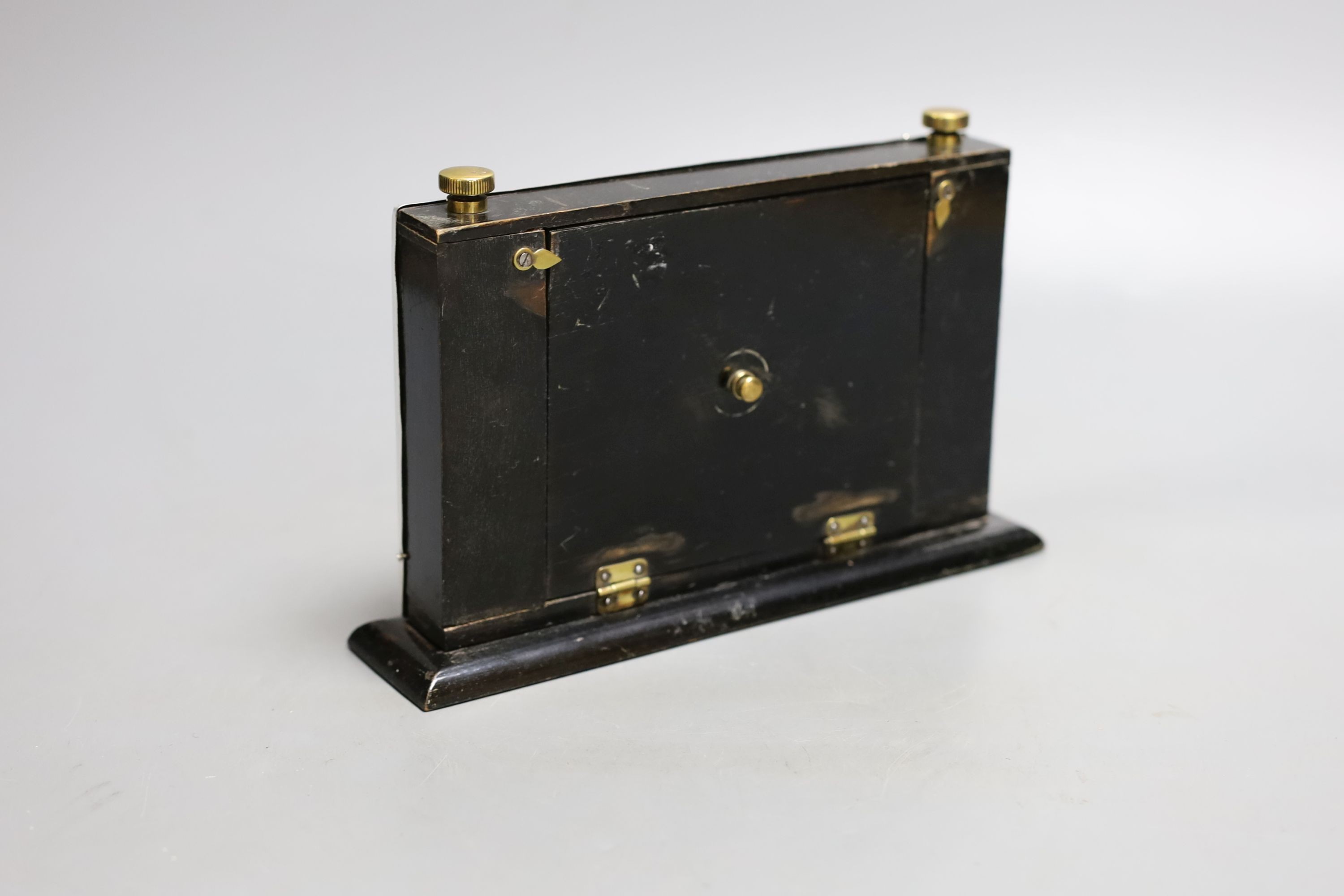 A modern silver mounted ebonised wood desk calendar, Birmingham, 1953, base 21.2cm.